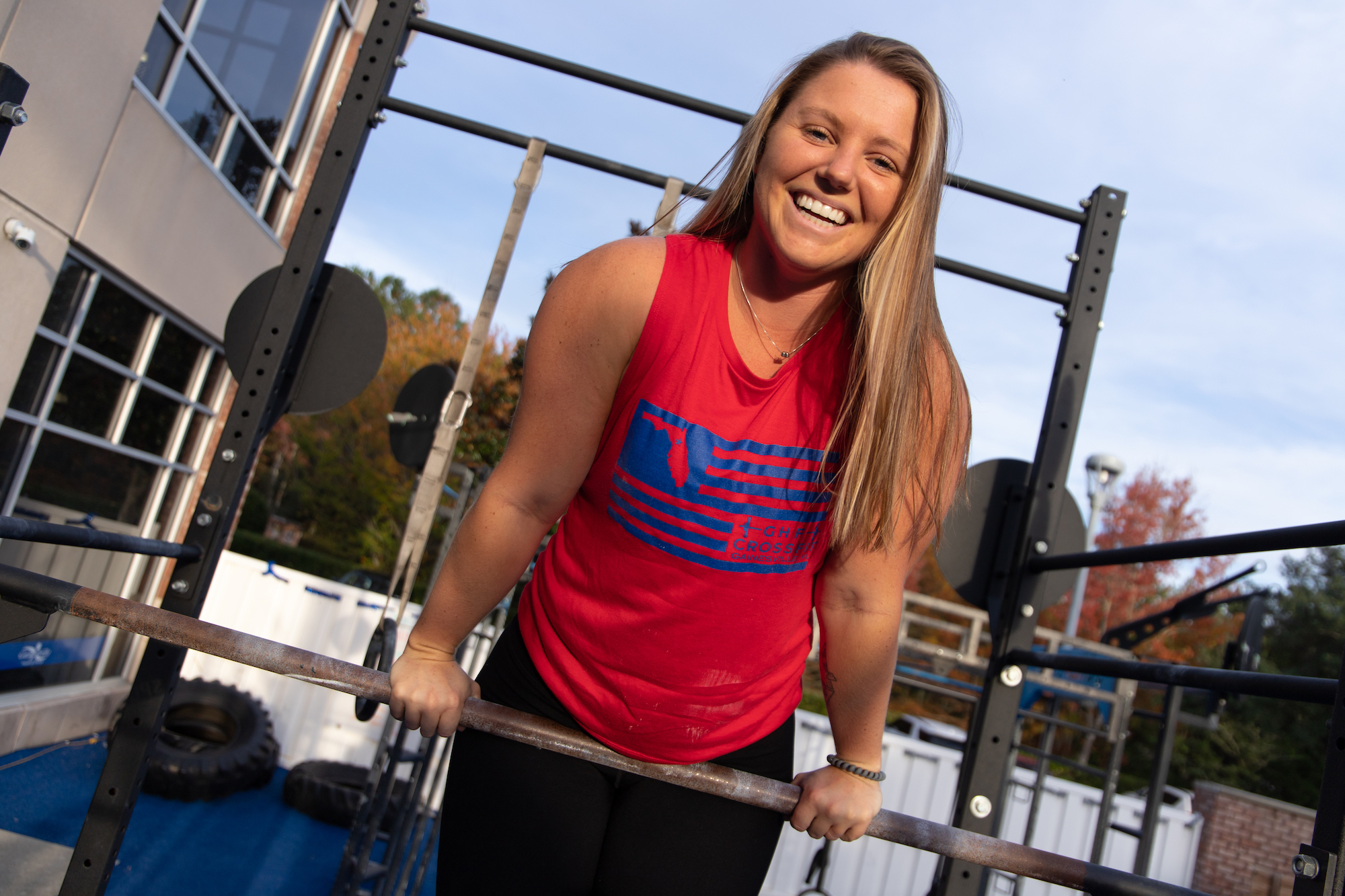 CrossFit Coach at Gainesville Health & Fitness Gym Nearby in Superman shirt 