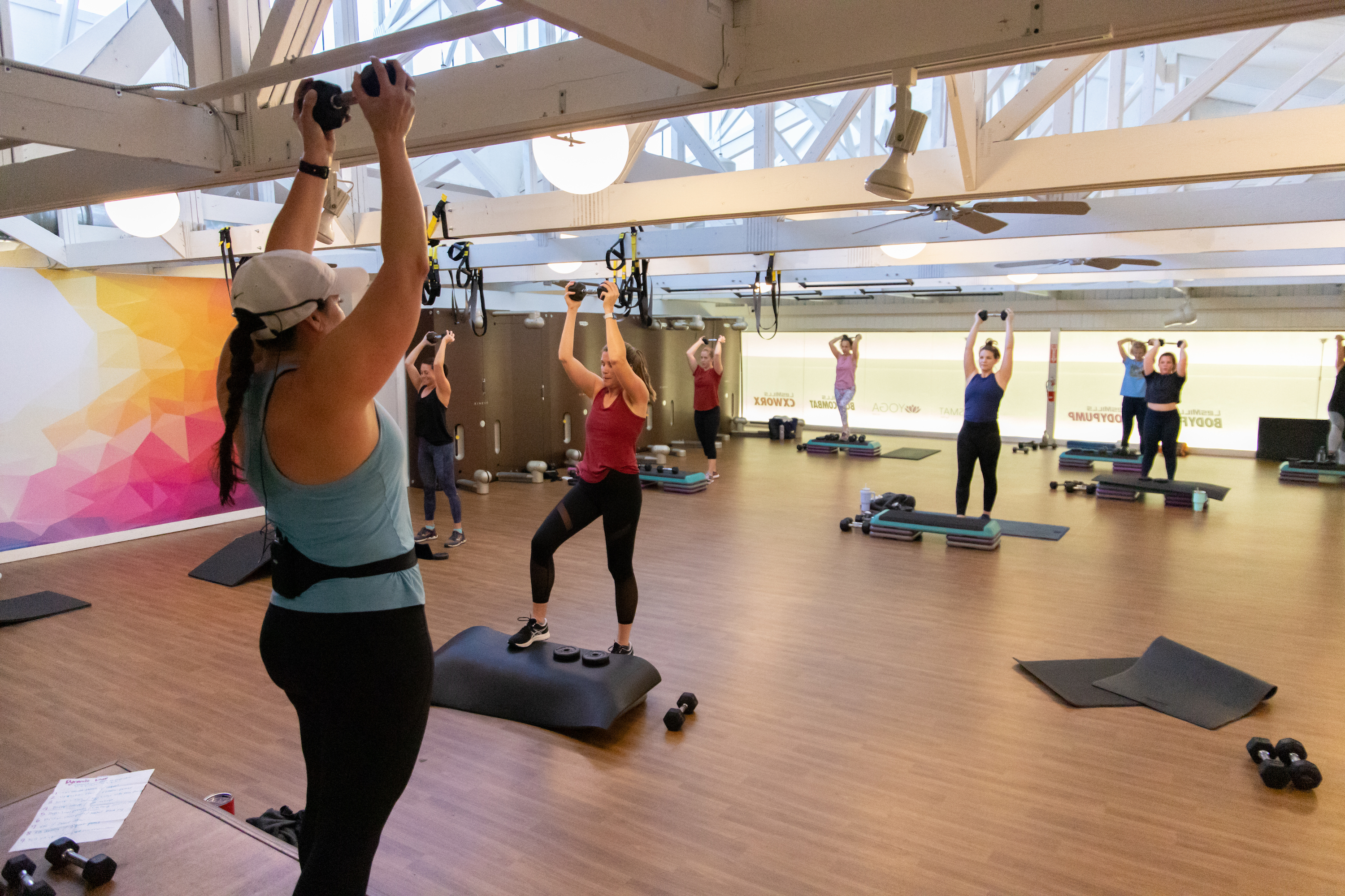 Group Fitness instructor teaching hiit for women at womens center gainesville