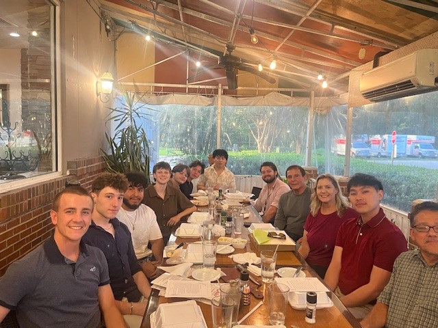 group of GHF employees at dinner celebrating exceptional performance