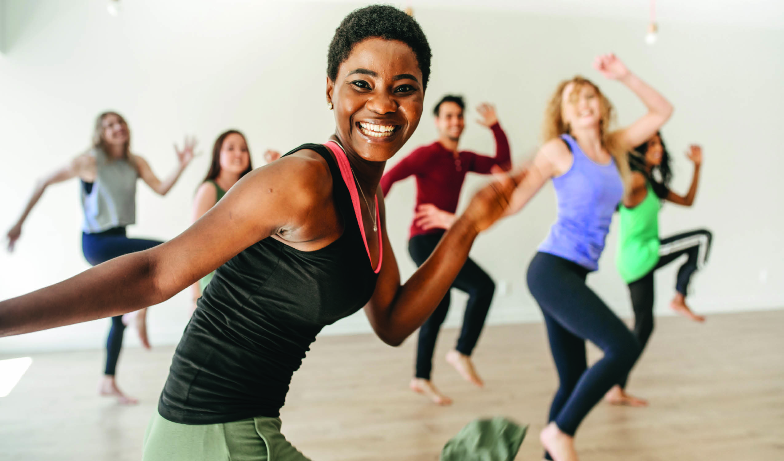 woman in a group exercise class at gainesville health & fitness