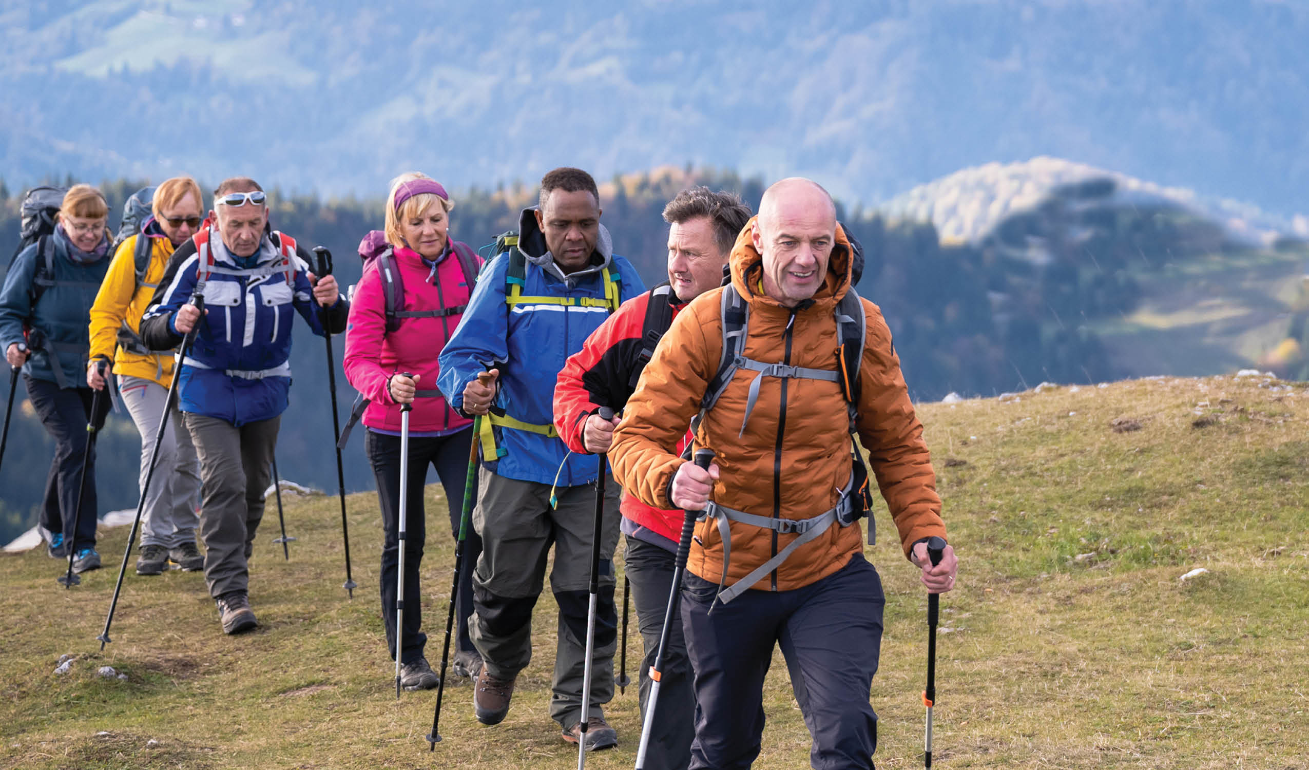 group of older hikers on a trail outdoor